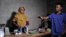 Wawan Susilo dan Anita, pengusaha jual beli kopi.