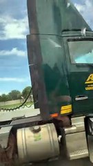 Man Clings to Truck at Highway Speed