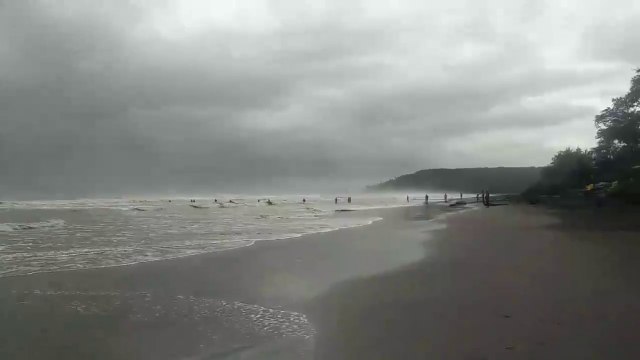 Boat crushed, life-saving in popular Goa Beach. In Goa, a storm overturned a fishing boat. Rescuers and local people immediately came to the rescue.