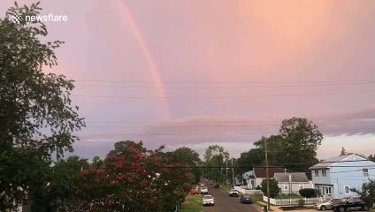 Beautiful double rainbow develops during New Jersey daybreak