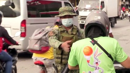Philippines reimposes quarantine measures as virus infections soar
