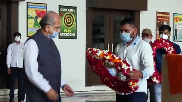 ASSAM BATTALION POLICE HAVALDAR GIVEN TRIBUTE AT AHMEDABAD AIRPORT BY GUJARAT HOME MINISTER PRADIPSINH JADEJA AND BHUPENDRASINH JADEJA