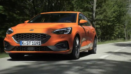 The new Ford Focus ST in Orange Fury Driving Video