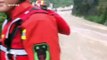 Chinese firefighters rescue motorists after car gets stranded in rapid floodwater