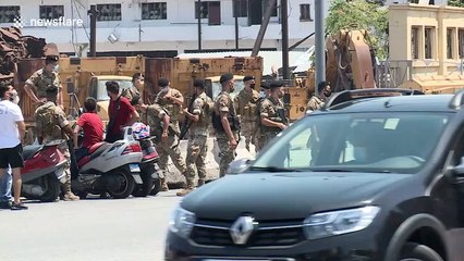 Armed military patrol streets as rescue operations begin in Beirut