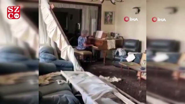 Lübnanlı kadın patlamada hasar gören evinde piyano çaldı