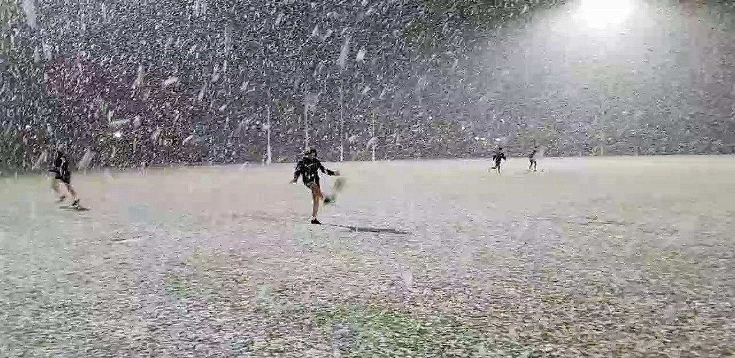 Rare Heavy Snowfall During Aussie Rules Practice in Australia