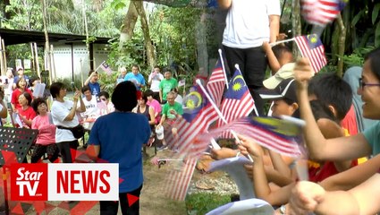 Singing in the park: Malaysians unite to sing patriotic songs