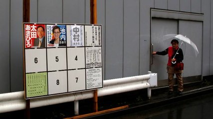 Typhoon drenches Japan on voting day