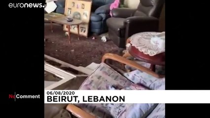 Woman plays Auld Lang Syne amid debris from Beirut blast