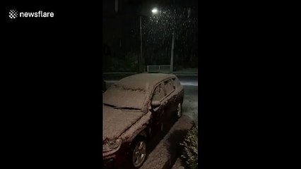 Amazing and rare scenes as first snow falls in Launceston Tasmania in a Century