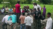 Deadly cobra rescued from 35-foot-deep well in India using a steel bucket