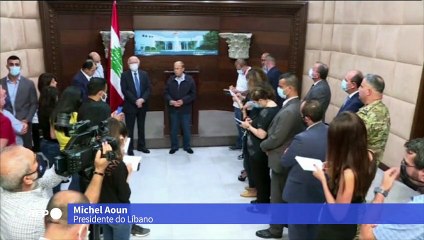 Presidente libanês cita "negligência" ou "míssil" como causa de explosão