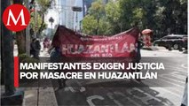 Manifestantes oaxaqueños marchan a embajada de EU; exigen esclarecer asesinatos