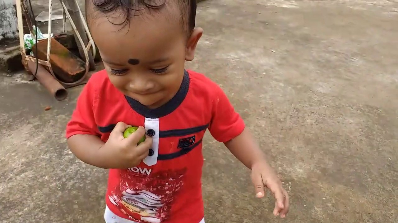 Funny little boy walking