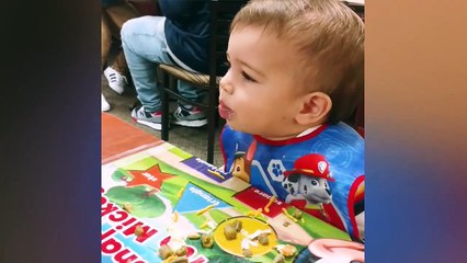 Funny kids eating ice cream for the first time