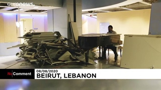 Lebanese student plays piano for volunteers clearing up rubble in Beirut hospital