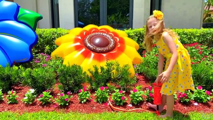Nastya pretends to play with huge toys