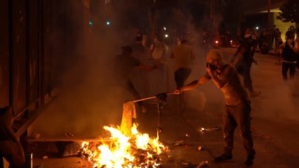 Beirut blast protests turn violent as security forces respond with tear gas and water cannon