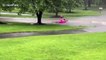 Man floats down flooded street on inflatable flamingo in New Jersey