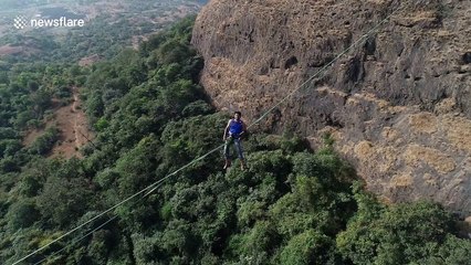Astonishing moment man attempts to walk on 262-feet-highline in western India