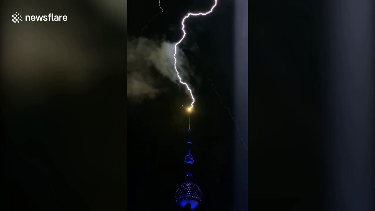 Lighting strikes Shanghai's Oriental Pearl Tower during storm