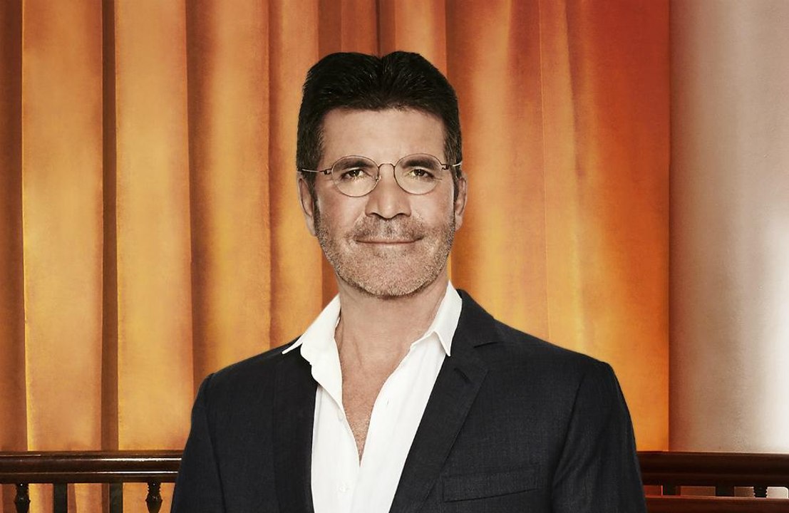 Simon cowell nach gebrochenem rückgrat zurück an die arbeit