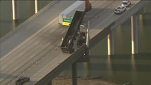 Truck stuck on Loop 202 sign