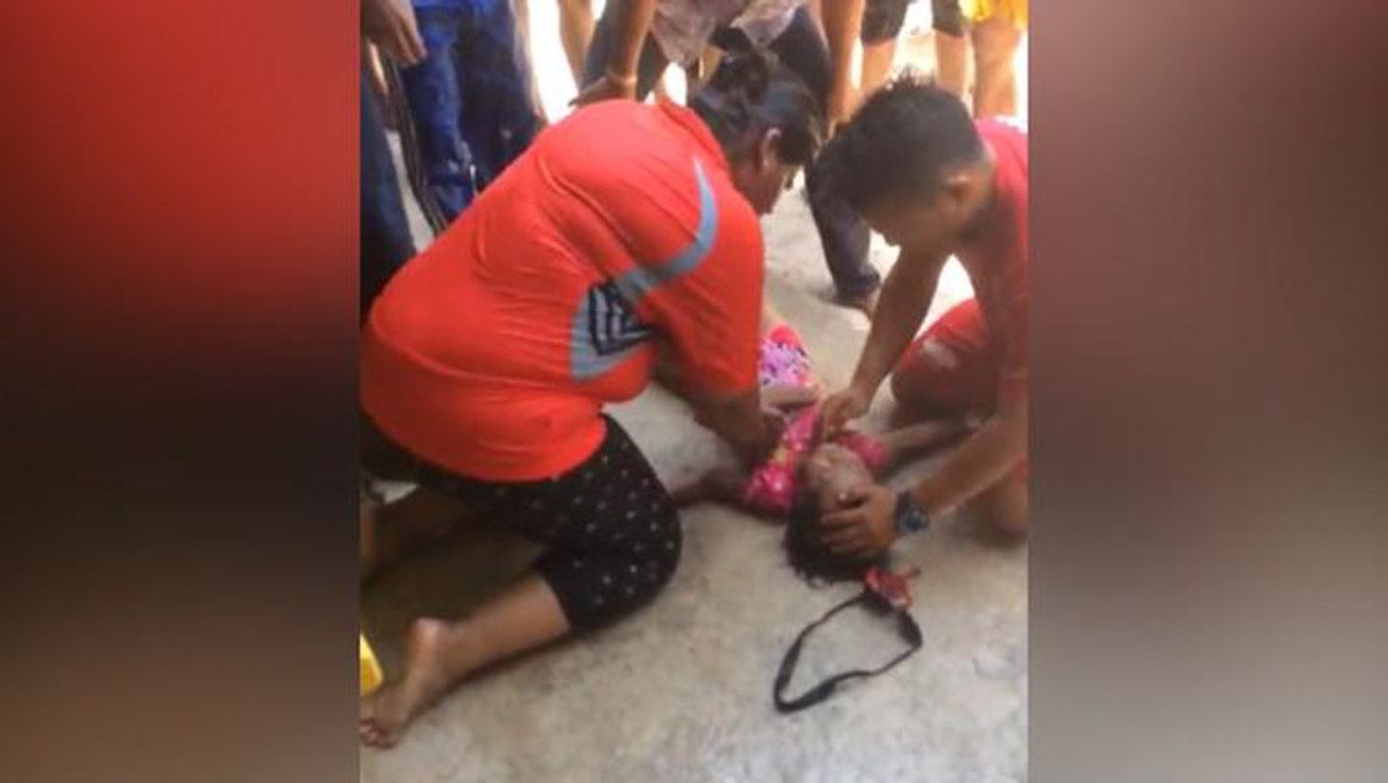 Lifeguard and woman win praise for saving near-drowning victim