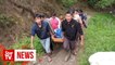 Indonesia bus plunges into ravine, 26 dead