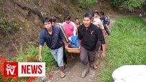 Indonesia bus plunges into ravine, 26 dead