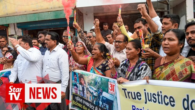 Indian police kill 4 men suspected of gang rape, murder; draw cheers