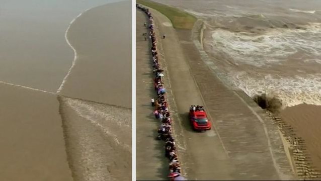 Spectacular tidal bore attracts huge crowds in east China