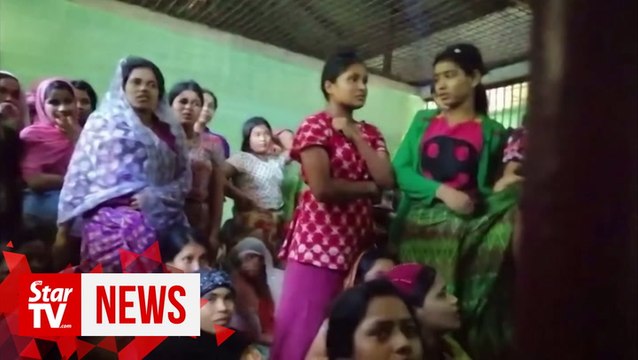 Rohingya weep in Myanmar court as they face charge of illegal travel