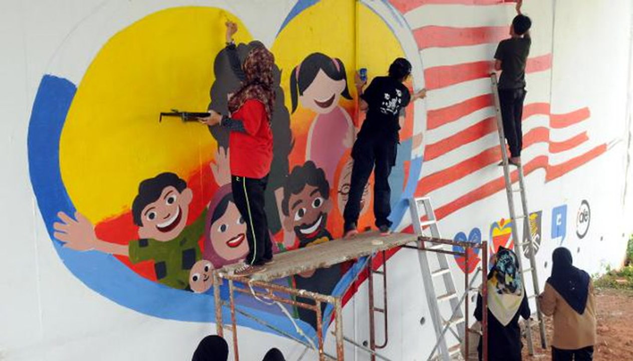 Celebrating National Welfare Month with painting murals