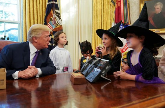 Trump gives Halloween welcome to children of White House reporters