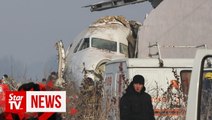 Plane crashes in Kazakhstan shortly after takeoff, at least 14 dead