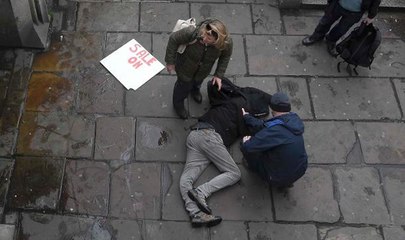 Bangs similar to gunfire heard outside Britain's parliament