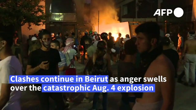 One week after blast, clashes erupt outside parliament in downtown Beirut (2)