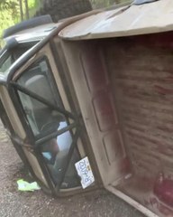 Truck Roles Over and Ends up Upside Down While Attempting to Cross Uneven Terrain