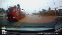 Hood flies off car driving along Chinese road