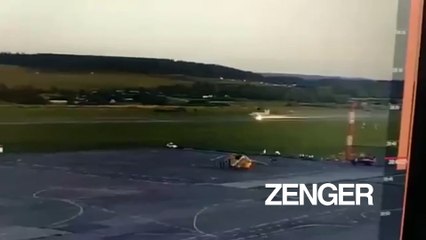 Russian fighter jet with broken landing gear lands