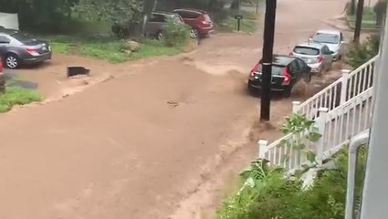 Steep streets look like rivers after storms