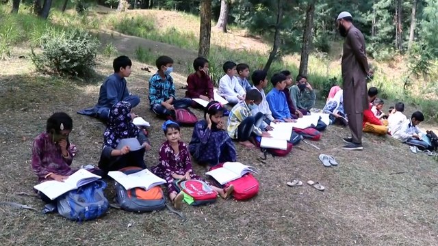 Kashmir village offers open-air classes as pupils struggle to learn online amid pandemic