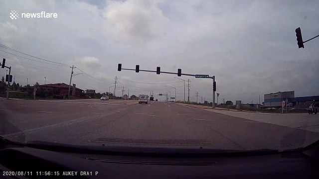 US motorcyclist 'avoids death' after speeding car fails to stop at intersection