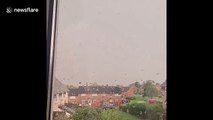 Terrified neighbour captures moment lightning strikes house in Wales