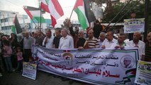 Palestinians march in solidarity with the victims of Beirut blast