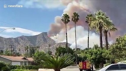 Ranch fire burns in hill over cluster of homes in Azusa, California