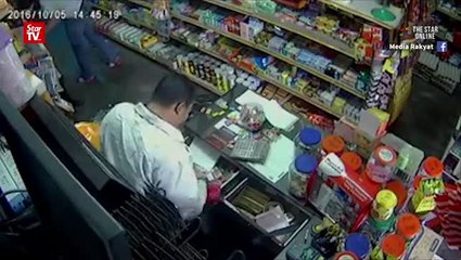 Armed robbers make off with RM4,000 in goods, cash