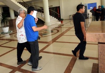 Man charged with bribing cop